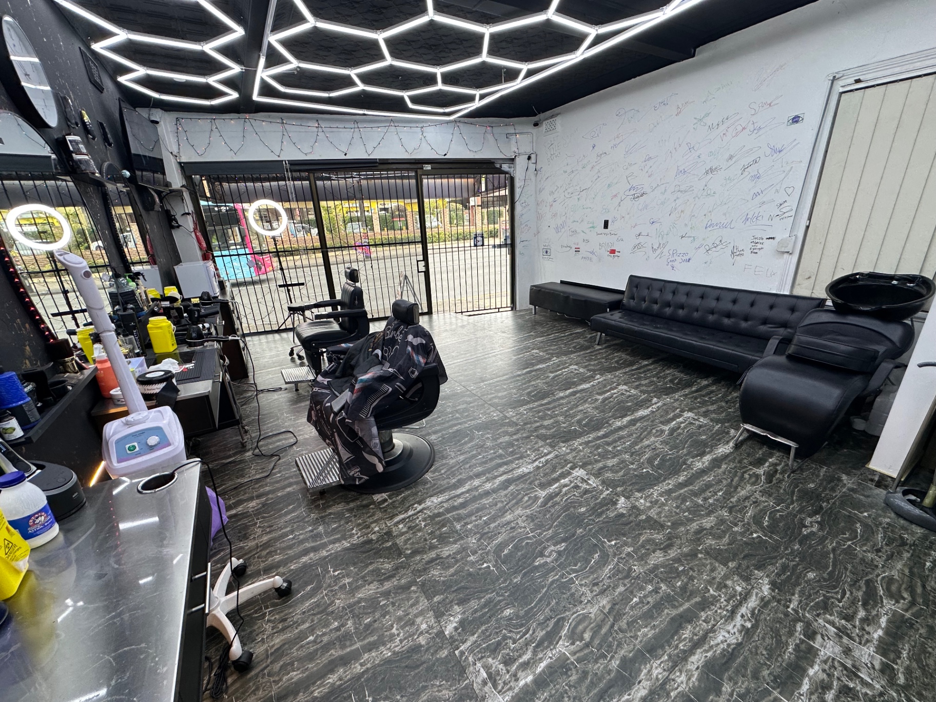Barber chairs and waiting lounge inside the shop