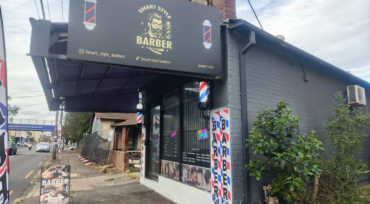 Smart Style Barbers entrance with barber pole